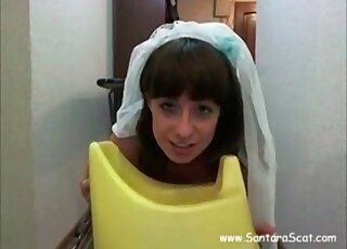 Nasty woman eats feces from the plate in front