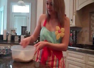 Housewife in the kitchen is ready to cook her poo