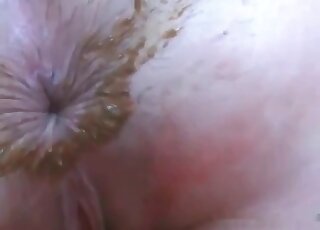 Asshole opening and closing in this amateur scat show